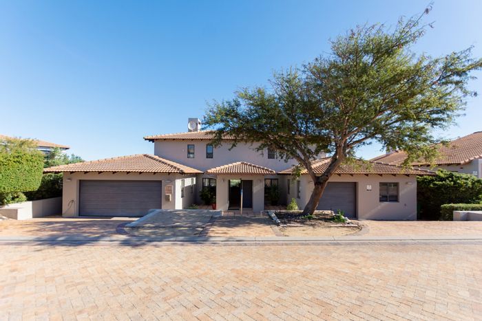 Langebaan Country Estate House For Sale: Golf course views, pool, spacious living areas.