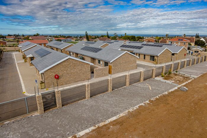 For Sale: Townhouse in C Place with security, carport, and energy-efficient features.