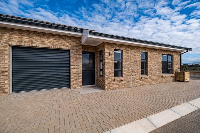 For Sale: Townhouse in C Place with 2 beds, garage, and security features.