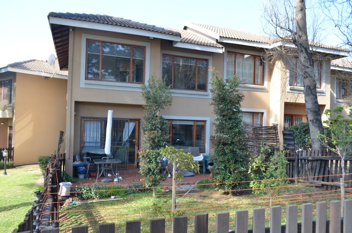 For Sale: Townhouse in Paulshof with garden, pool, and pet-friendly amenities.