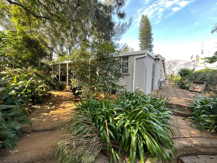 Tugela Mouth House For Sale: Workshop space, ample parking, and coastal access.