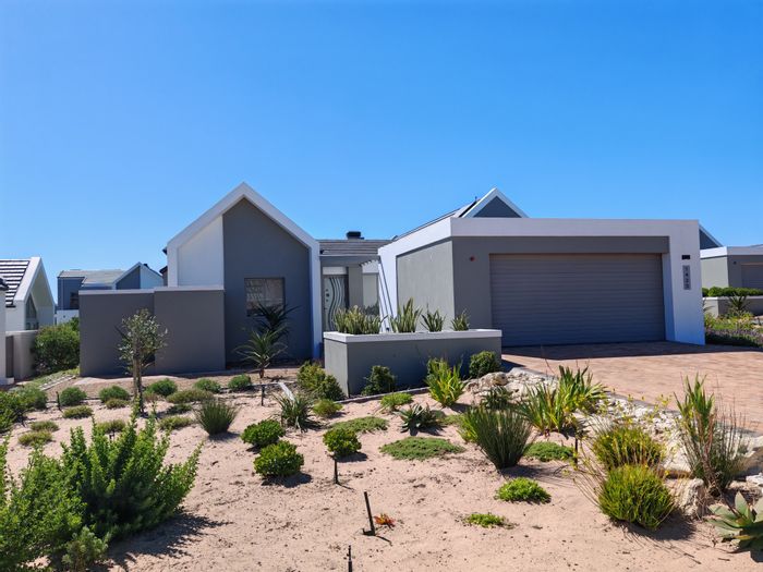 For Sale: House in Langebaan Country Estate with golf course, clubhouse, and security.