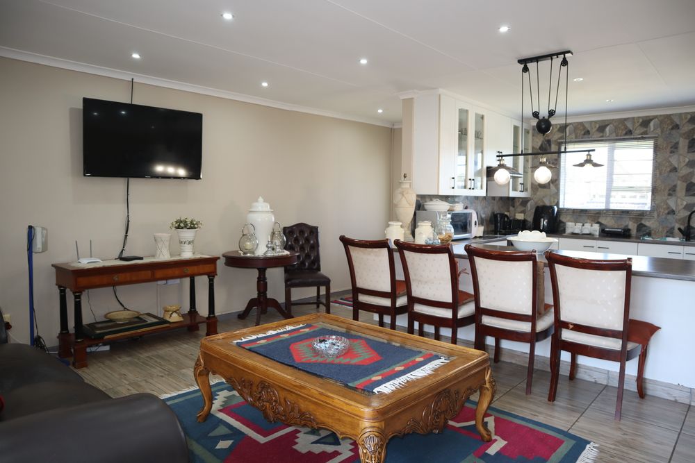 Open Plan TV & Kitchen Area