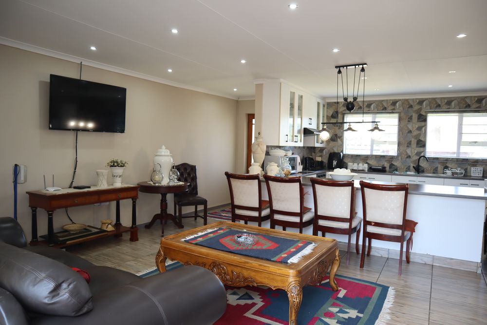 Open Plan TV & Kitchen Area