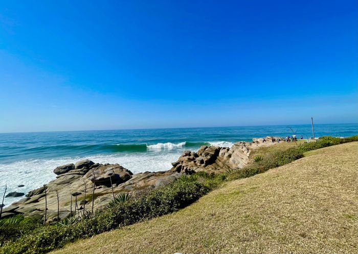 Oceanfront house in Shakas Rock for sale, 7 bedrooms, business zoning, beach access.