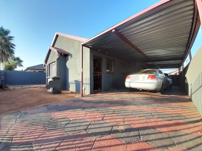 For Sale: Guest House in Lotus Gardens with 3 bedrooms, carport, and secure access.