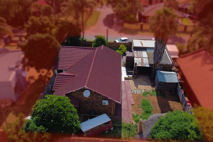 House For Sale in The Orchards: 4 Bedrooms, spacious yard, ample parking.