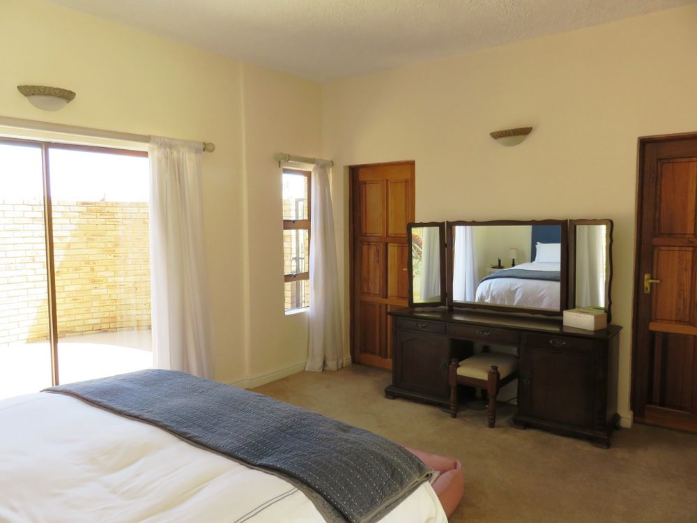 Main bedroom opens to private courtyard and to pool/jacuzzi deck