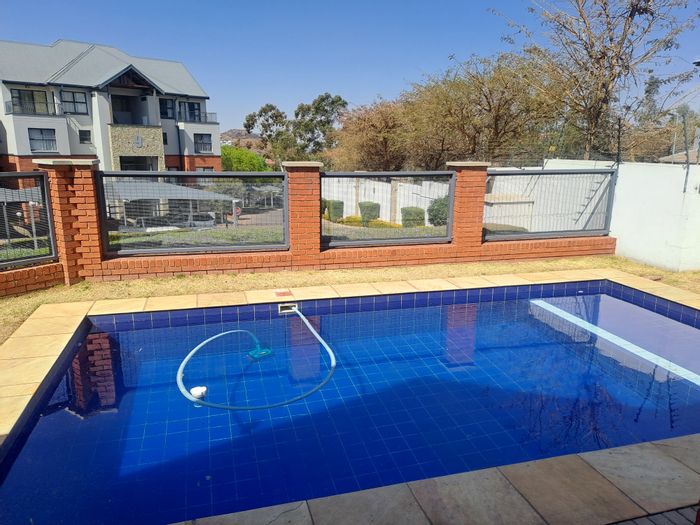 For Sale: Oakdene Townhouse with gym, pool, security, and private balcony.