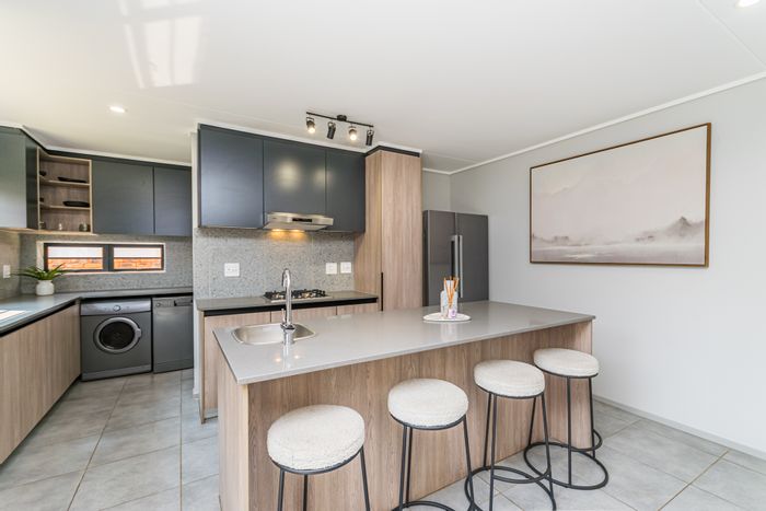 Amberfield Townhouse For Sale: 3 beds, private garden, automated garage, shared amenities.