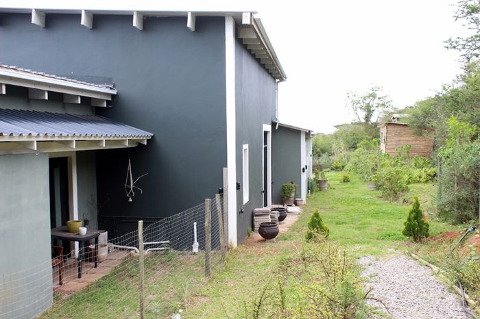 For Sale: Spacious 4-bed house with pool, borehole, and extra land in Bathurst Central.