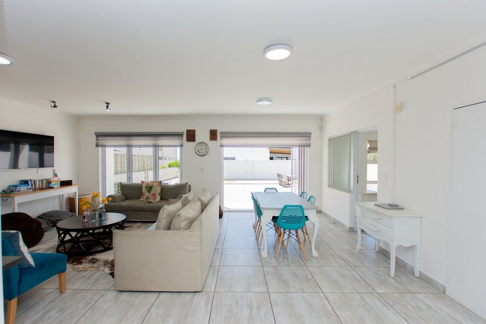 Lounge with Stacker doors creating indoor/ outdoor living