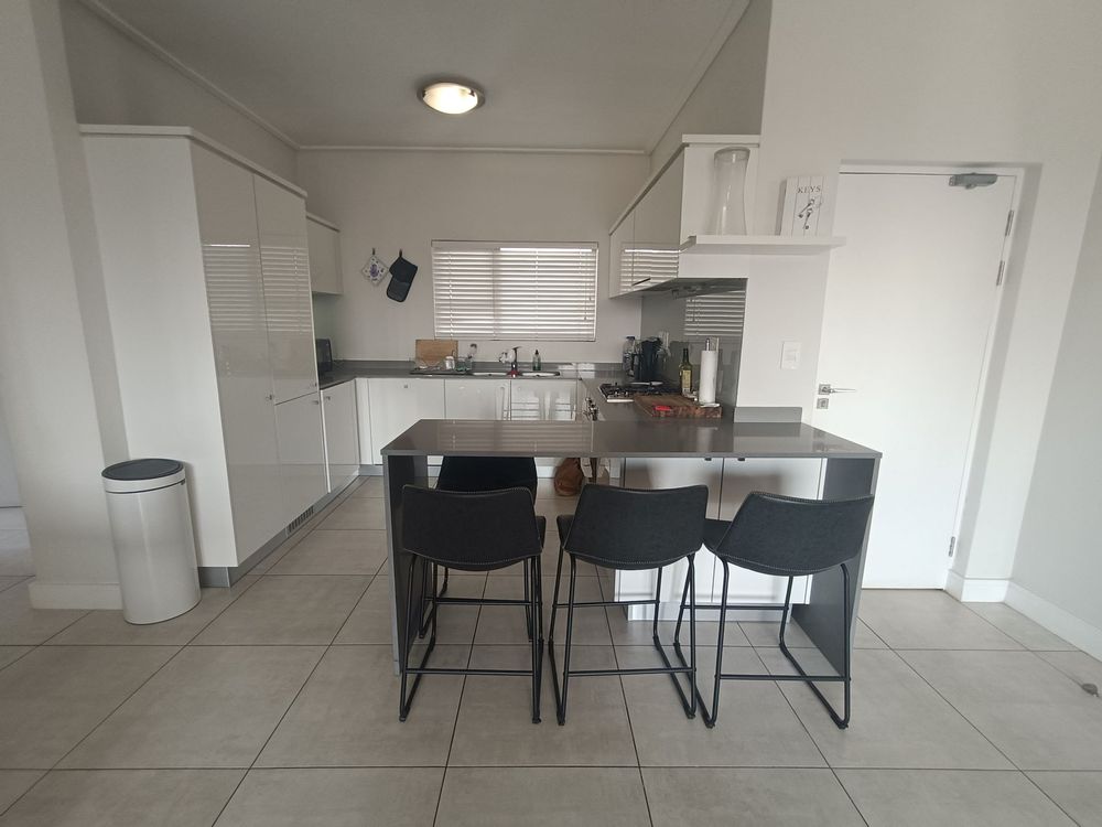 Kitchen Counter with Barstools