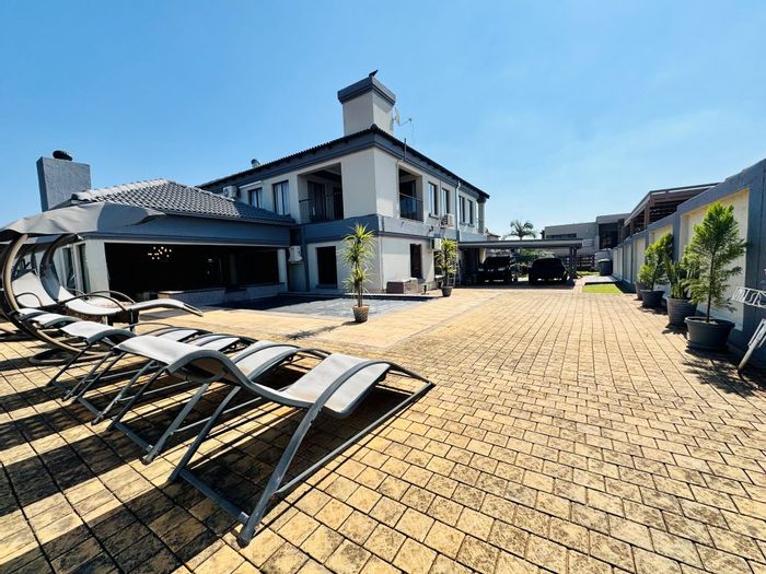 For Sale: House in Zambezi Country Estate with pools, solar power, and staff accommodation.