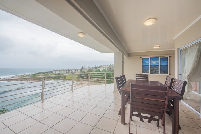 For Sale: Uvongo Beach Apartment with 3 bedrooms, ocean views, and private beach access.