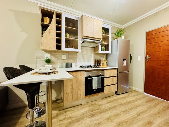 For Sale: 2-Bedroom Apartment in Roodepark Eco Estate with security and eco-friendly features.