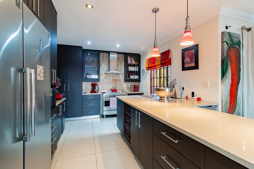 Modern kitchen is open plan to the living room