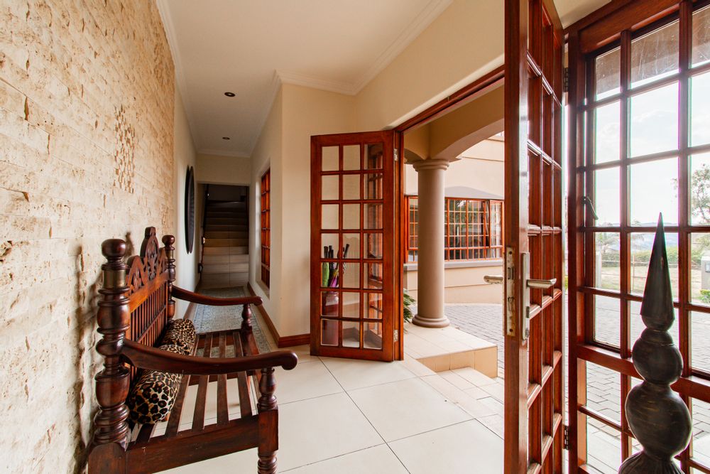 Double doors into the entrance hall