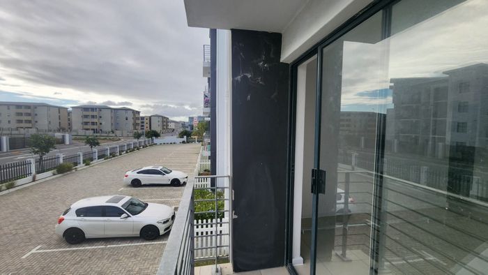 2-Bedroom Apartment For Sale in Parklands with balcony, secure parking, and 24-hour security.