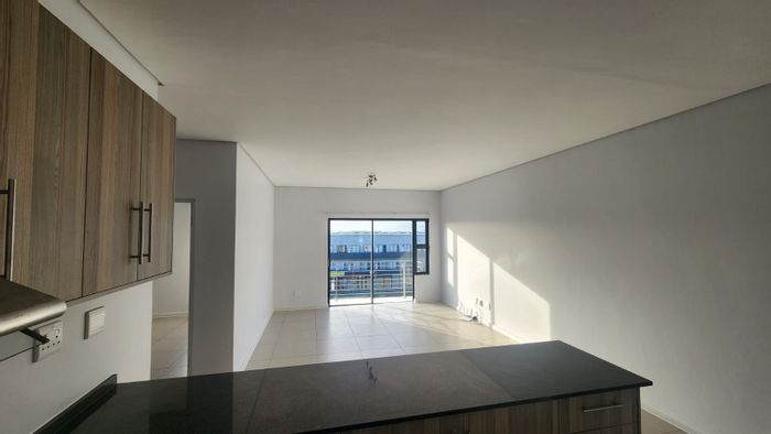 2-Bedroom Apartment For Sale in Parklands with security, parking, and outdoor space.