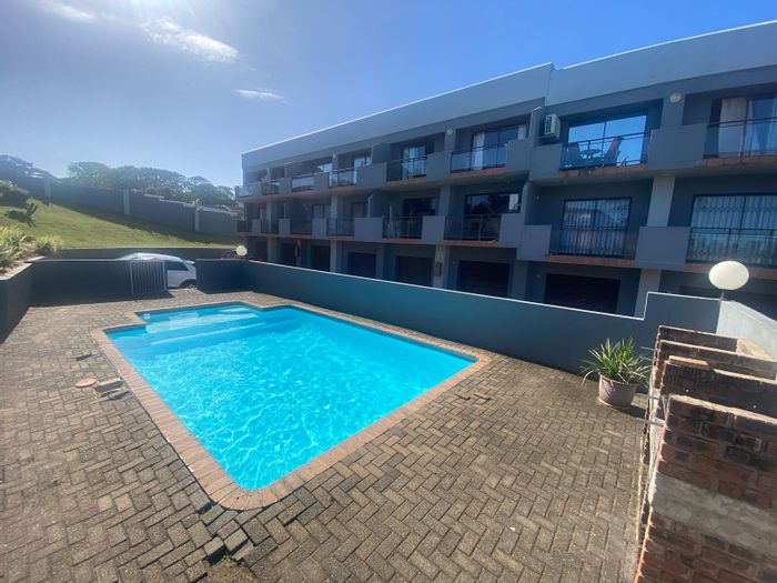 For Sale: Apartment in Manaba Beach with pool, balcony, and garage access.