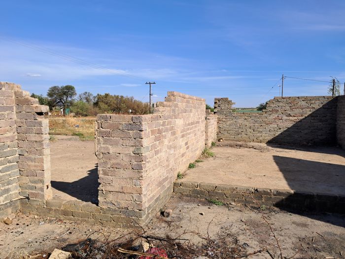 Vacant Land Residential For Sale in Ventersdorp Central with partial brick structure.