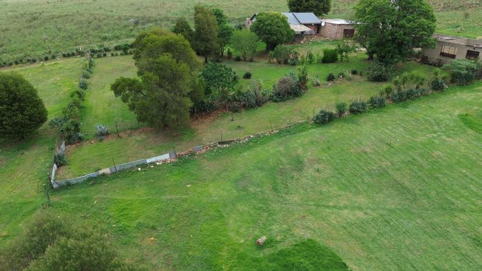 Farm for Sale in Westonaria Central: 2.53 hectares with building structures and fertile land.