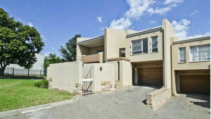 Spacious Sunninghill townhouse for sale with private patio and secure parking.