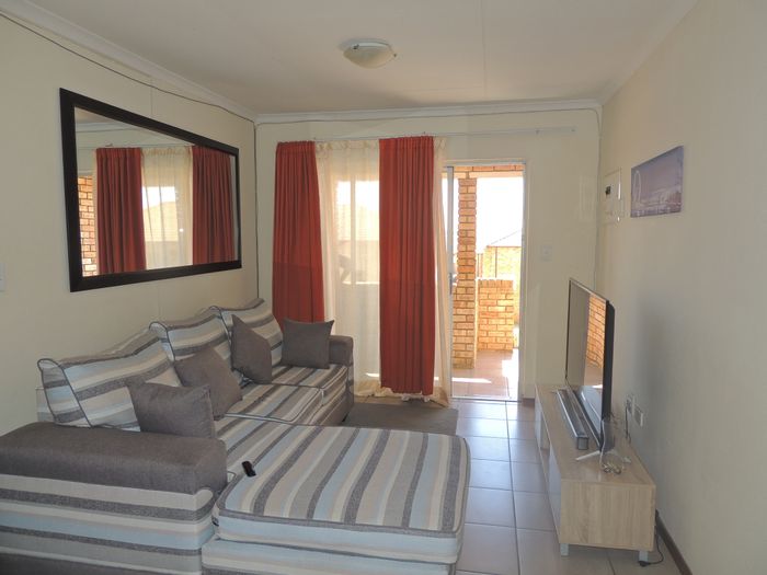 Elandspark Apartment For Sale: Two bedrooms, private balcony, secure parking, excellent security.