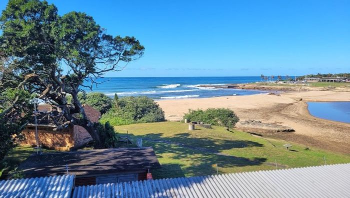 Beachfront apartment in Shelly Beach for sale, 2 beds, secure complex, sea views.