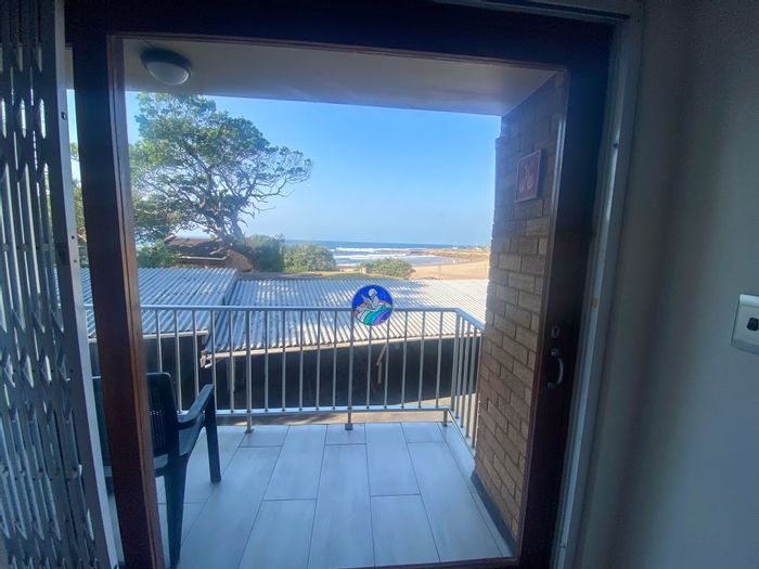 For Sale: Apartment in Shelly Beach with sea views, balcony, and secure parking.