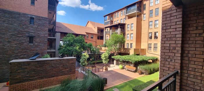 Newlands Flat For Sale: 2-bed, balcony, covered parking, access to village amenities.