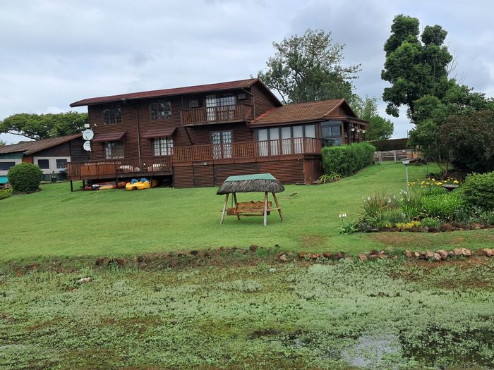 For Sale: House in Albert Falls with 4 bedrooms, jacuzzi, and outdoor entertaining area.