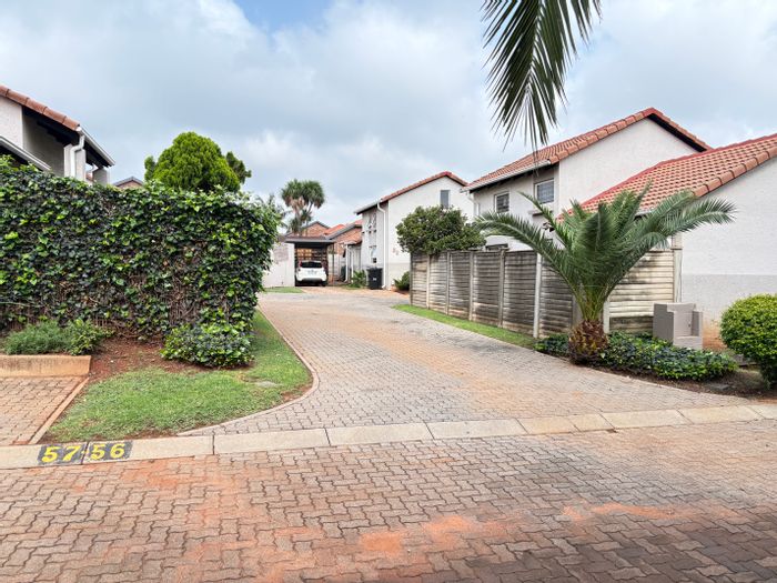 For Sale: Weltevreden Park Townhouse with 3 bedrooms, garden, and communal pool.