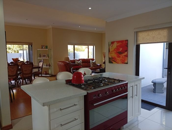 For Sale: House in Midstream Meadows with open-plan living, outdoor braai, and inverter.