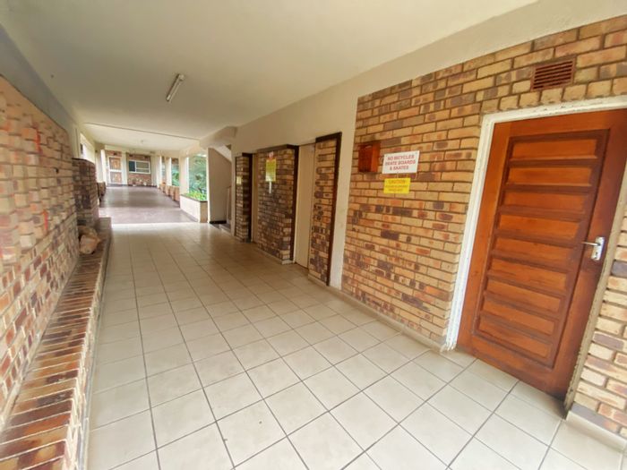 For Sale: Apartment in Horizon View with pool, braai area, and secure parking.