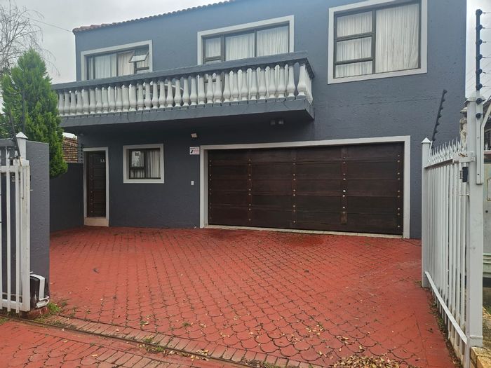 4-Bedroom House for Sale in Greenhills with Sunroom, Double Garage, and Guest Loo.