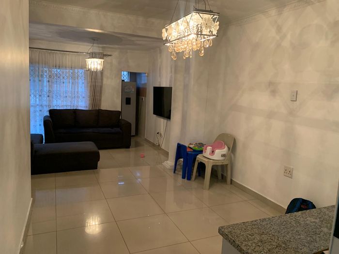 Croftdene Townhouse For Sale: 4 Bedrooms, spacious garden, security features, and parking.