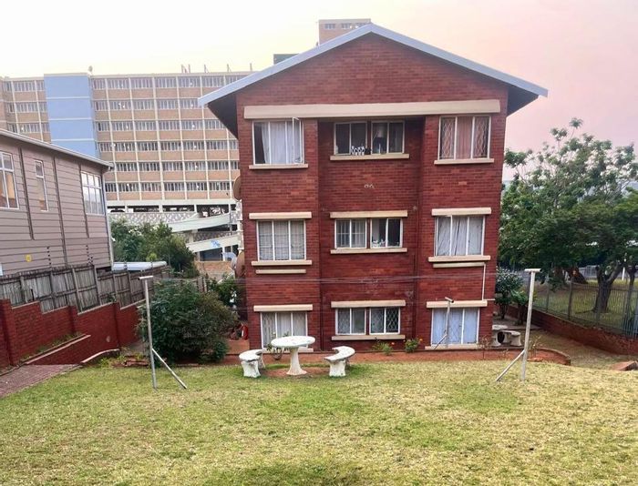 Essenwood Apartment For Sale: Secure block, garage, near Avondale Shopping Centre.