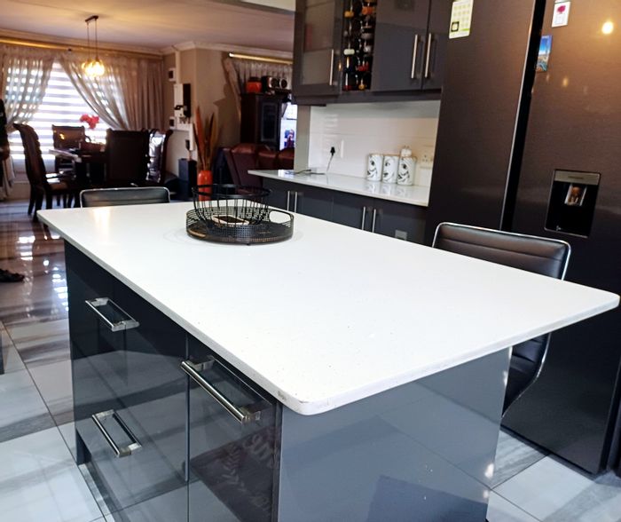 For Sale: House in Embalenhle with 3 bedrooms, outside room, and spacious yard.