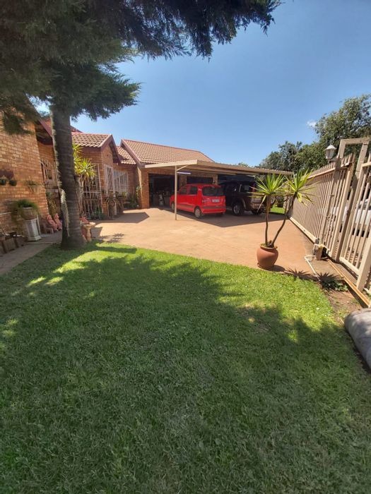 3-Bedroom House For Sale in Westonaria Central with pool, garage, and braai area.