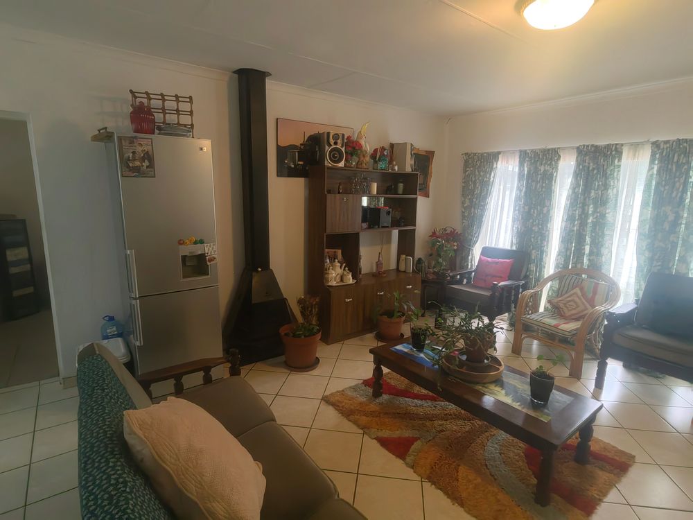 Open Plan Lounge with Fireplace in 3 bed House