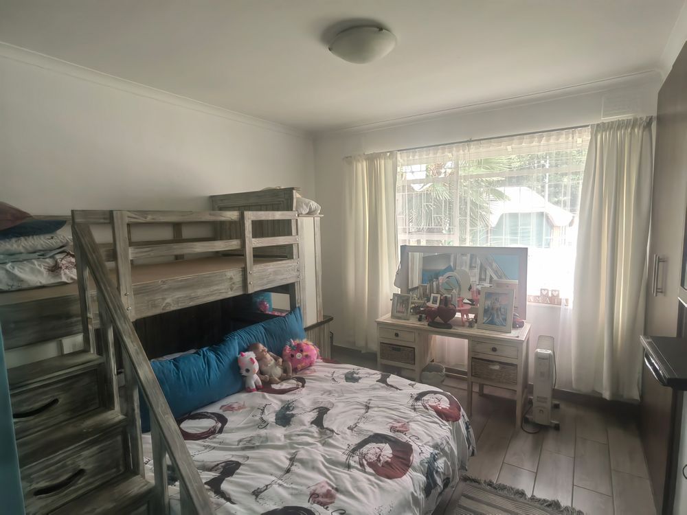 bedroom with build in cupboards Main house