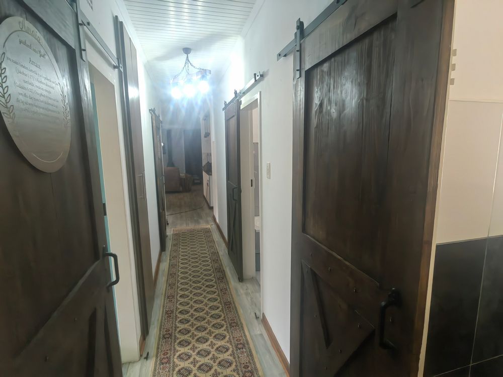 All Bedrooms and Bathrooms has Barn doors on Main house