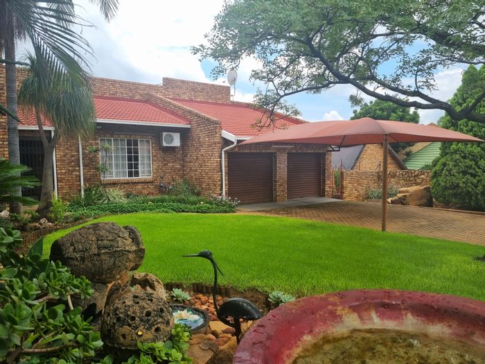 For Sale: Spacious 4-Bedroom House in Geelhoutpark with Pool and Security Features.