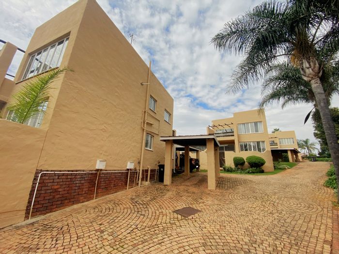 For Sale: Apartment in Roodekrans with pool, security, and balcony views.
