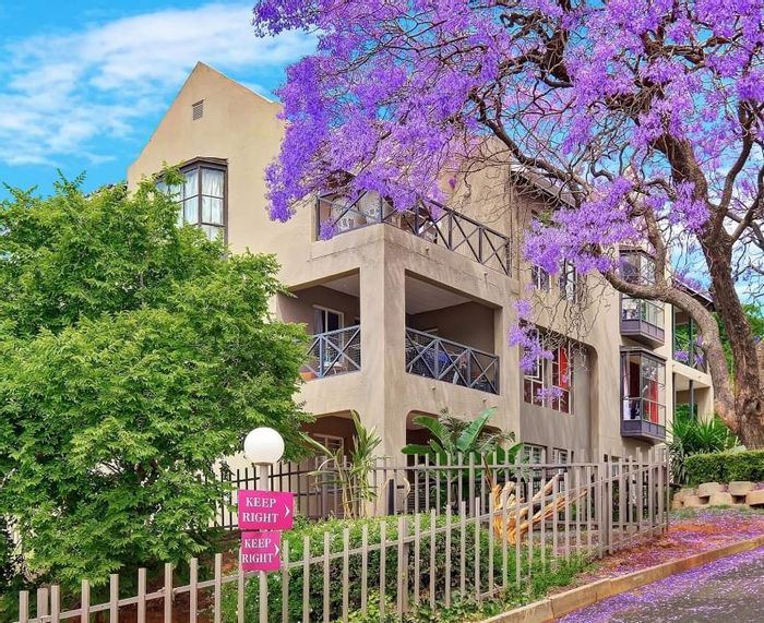 For Sale: Apartment in Melville with pool, gym, and squash court access.
