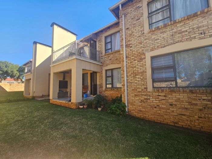 For Sale: 2-Bedroom Townhouse in Randpoort with garden, patio, and braai area.