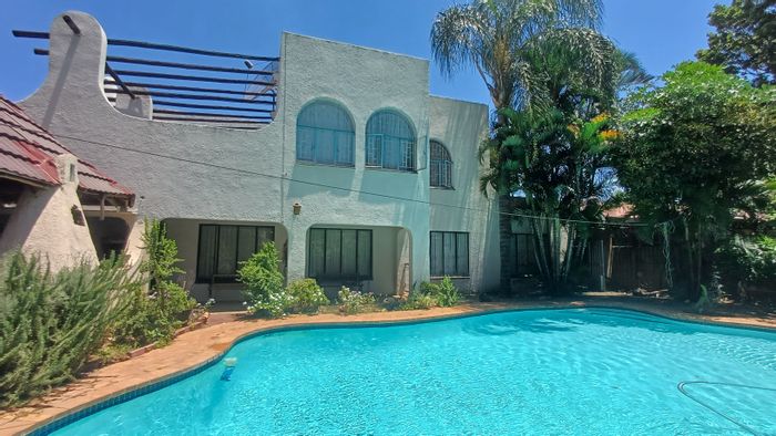 For Sale: Spacious 5-bedroom house in Dorandia with pool, study, and garages.