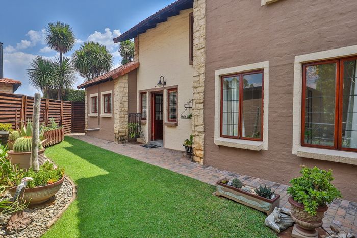 For Sale: Townhouse in The Coves with garden, patio, double garage, and solar energy.